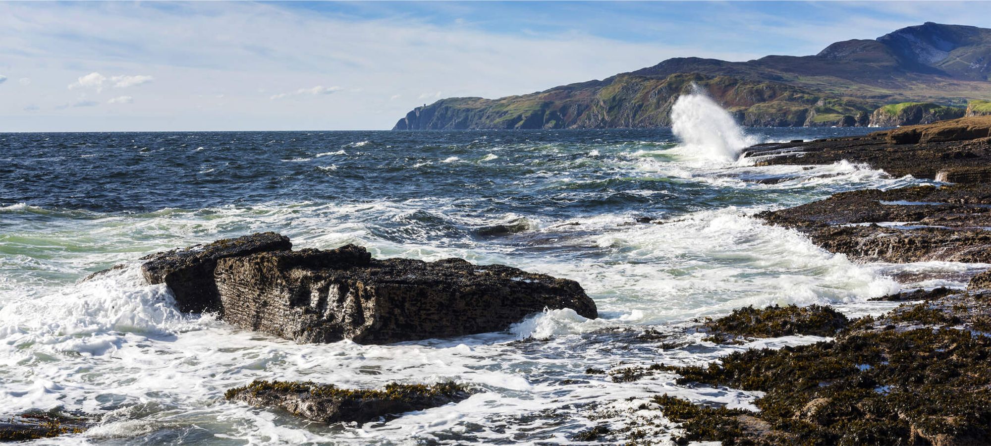 Waves crashing on the shore at Muckross Head. Walking tour  with DanyGal, Fáilte Ireland Certified Tour Guide, County Donegal